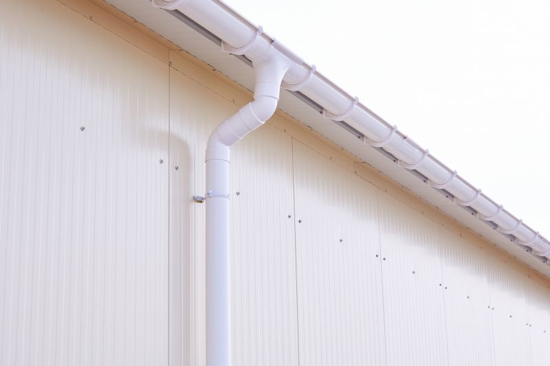 Plastic Downspout Installation in Longmont, CO